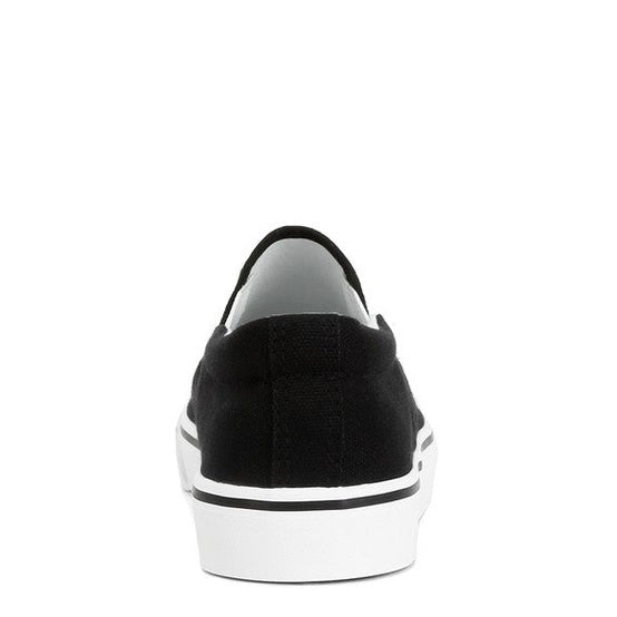 Rag Company black canvas slip on sneakers for women with white sole and minimalist design