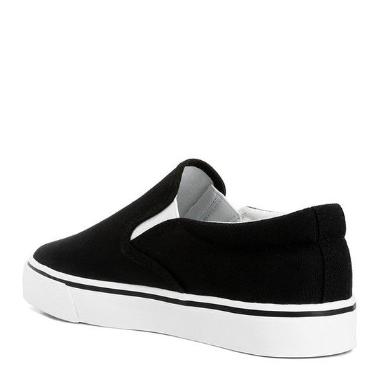 Rag Company black canvas slip on sneakers for women with white rubber sole and low profile design