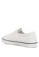 Rag Company women's white canvas slip on sneakers with black trim and rubber sole