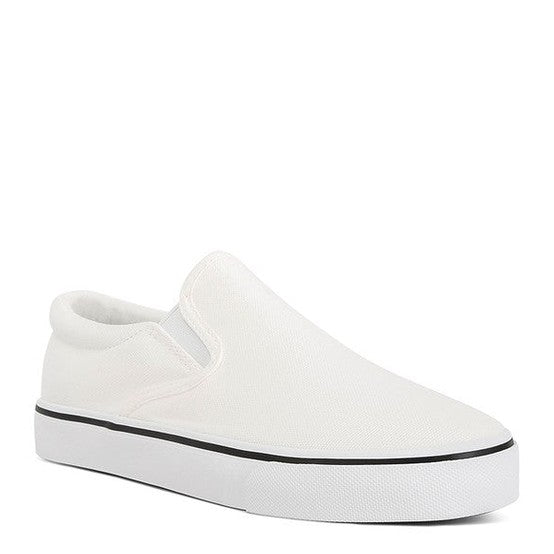 Rag Company white canvas slip on sneakers for women with cushioned sole and black stripe detail