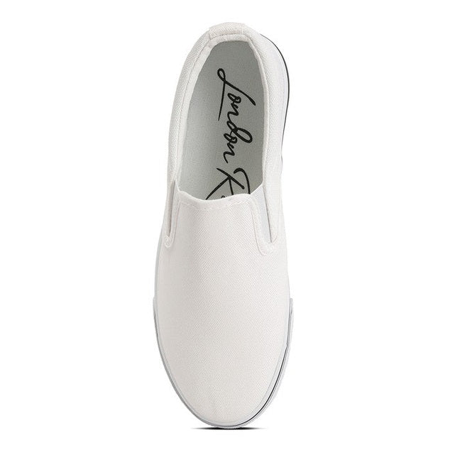 Rag Company women's white canvas slip on sneakers with minimalist design and comfortable fit