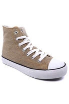 Trendy women's canvas sneakers with patterns in beige featuring white laces and rubber sole