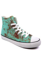 Trendy women's canvas sneakers with patterns in turquoise and brown for stylish casual wear