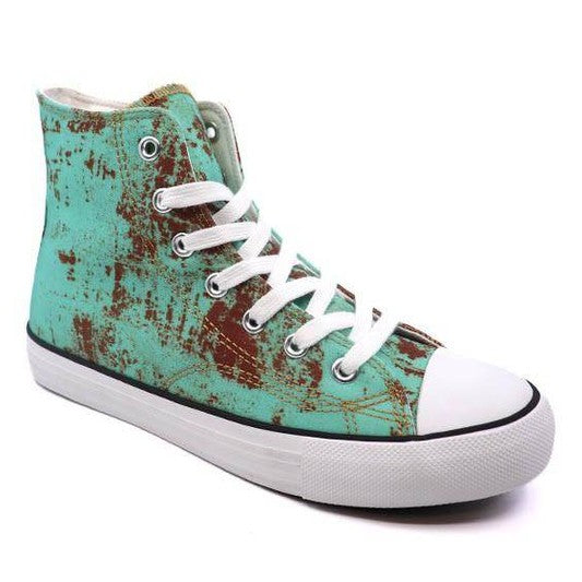 Trendy women's canvas sneakers with patterns in turquoise and brown for stylish casual wear
