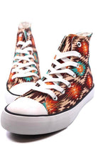 Stylish women's canvas sneakers with patterns featuring colorful tribal designs and white laces