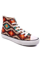 Stylish women's canvas sneakers with patterns featuring vibrant tribal designs for casual wear