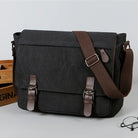 Black canvas totes bag with brown leather accents for stylish carrying