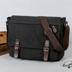 Black canvas totes bag with brown leather accents for stylish carrying