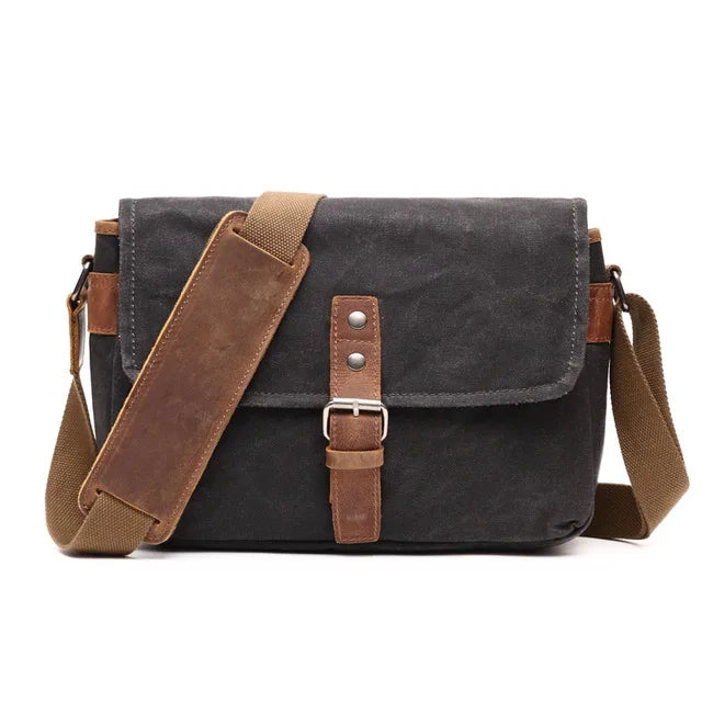 Men's black canvas totes bag with leather accents for everyday use