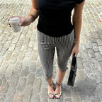 Women's black and white checkered capri dress pants for casual outings