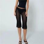 Women's sheer black capri dress pants, perfect for summer outings