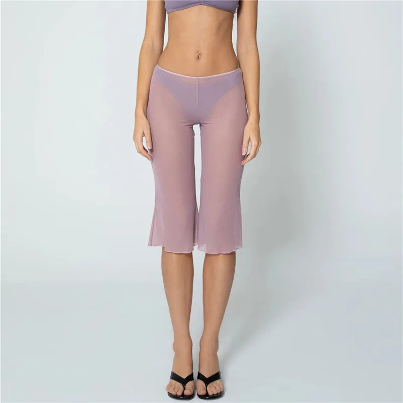 Women's sheer capri dress pants in light pink, perfect for summer outings