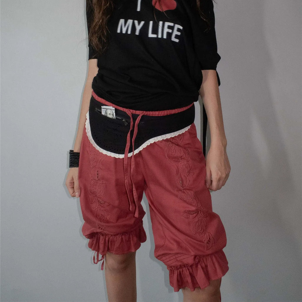 Women's capri dress pants in burgundy with ruffled hem for casual wear