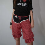Women's capri dress pants in burgundy with ruffled hem for casual wear