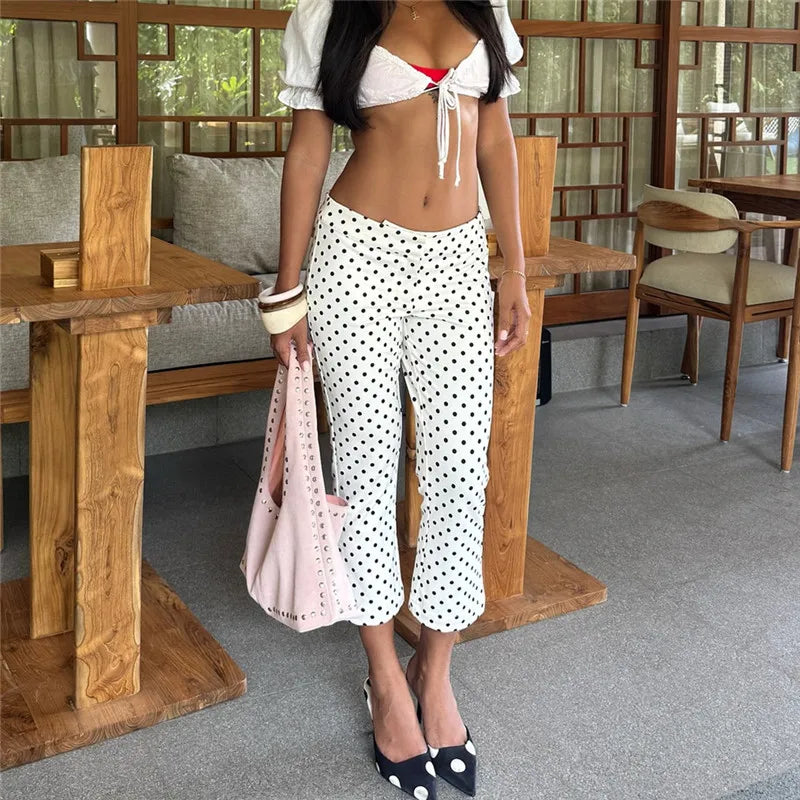 Women's polka dot capri dress pants in lightweight fabric, perfect for summer outings