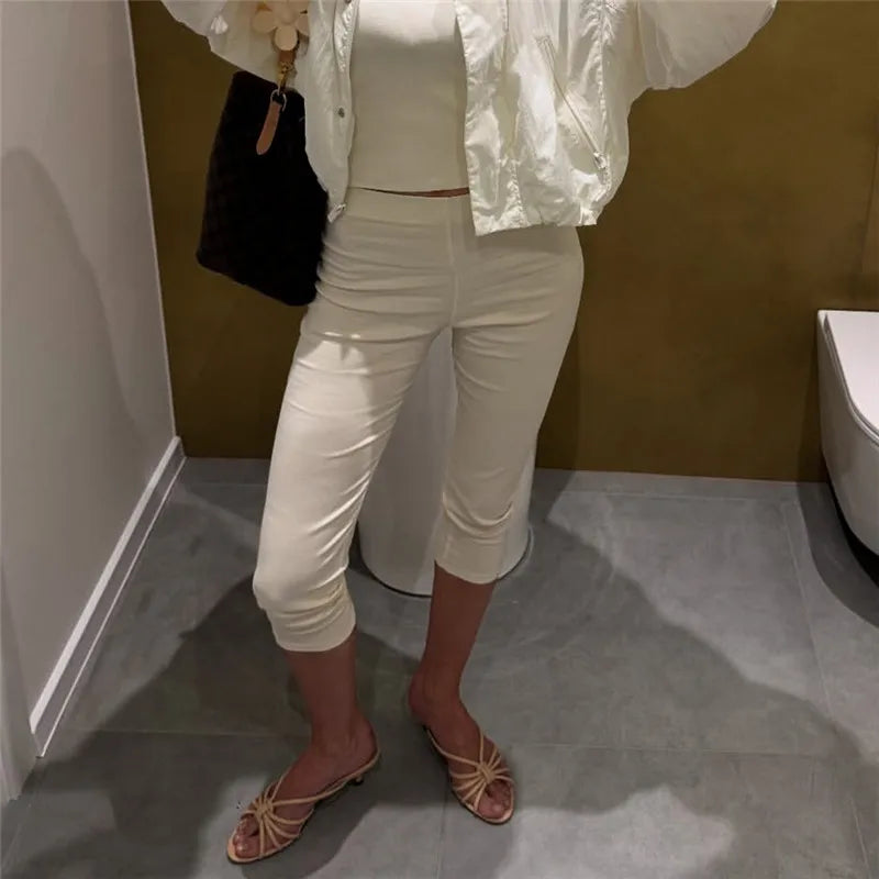 Women's capri dress pants in cream, perfect for casual outings