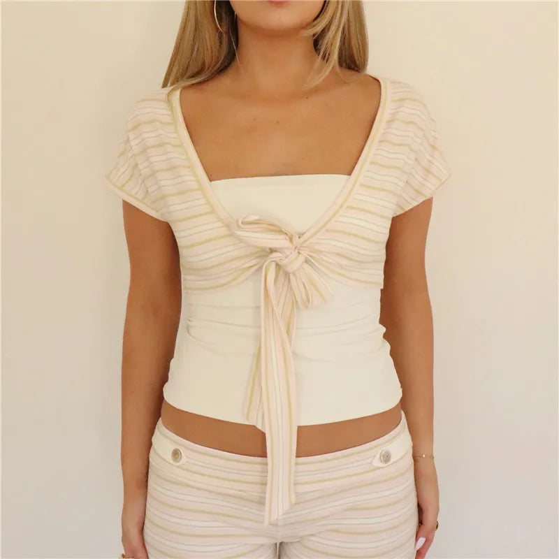 Women's cropped cardigan in white and beige, perfect for casual outings