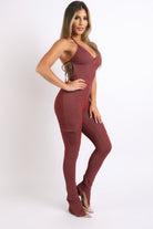 Women's cargo pocket halter jumpsuit in burgundy with zipper front and slim fit design