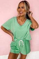 YNIQUE casual drawstring shorts set in green with V-neck top and elastic waistband shorts