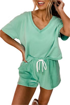 YNIQUE casual drawstring shorts set in mint green with V-neck top and side pockets