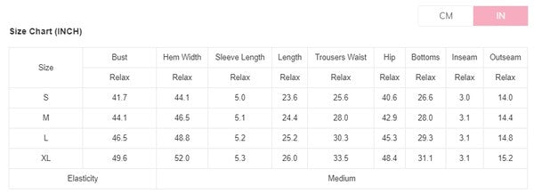 Size chart for casual drawstring shorts set by YNIQUE showing measurements in inches for bust, hem, sleeve, length, waist, hip, bottoms, inseam, and outseam