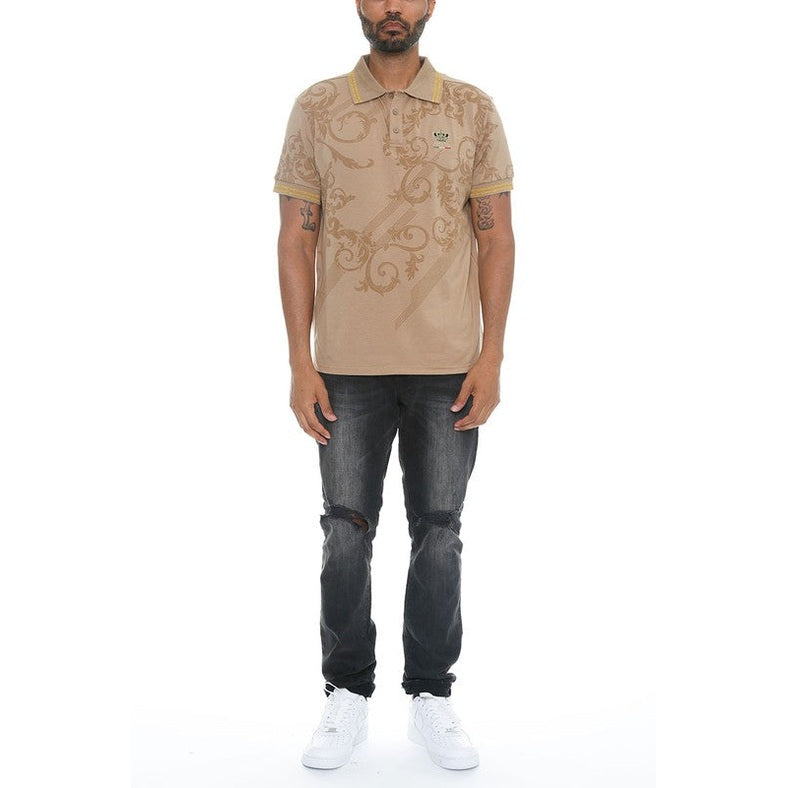 WEIV casual embroidered polo shirt in beige with intricate designs worn with black ripped jeans and white sneakers