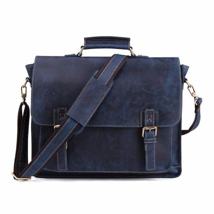 Casual leather briefcase in navy blue with adjustable shoulder strap and buckle closures