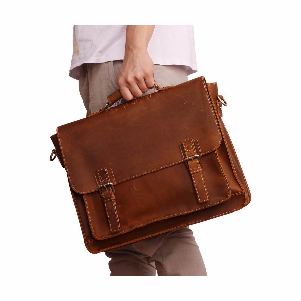 Brown casual leather briefcase with dual buckles and a top handle for professional use