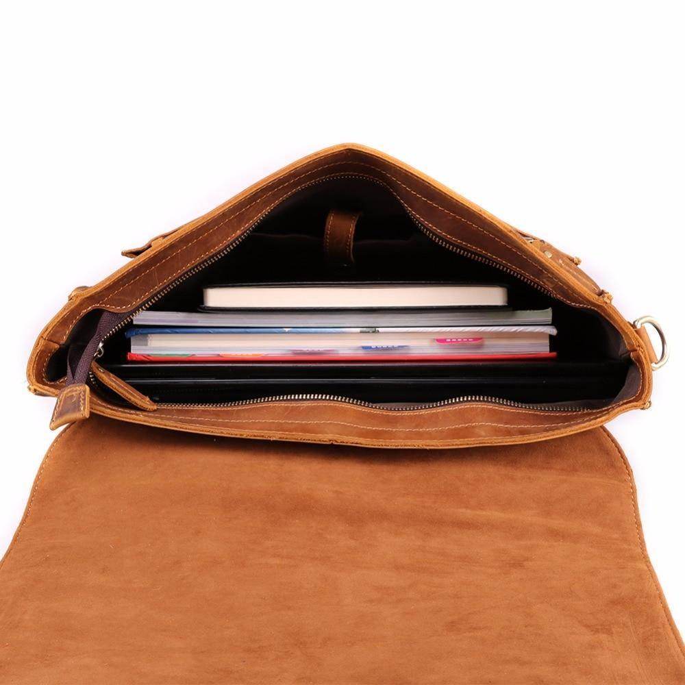 Interior view of a casual leather briefcase showing organized compartments for documents and devices