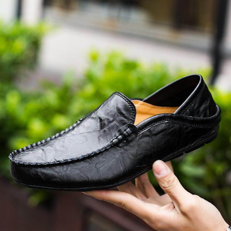 Black lightweight casual loafers designed for comfort and style in warm weather