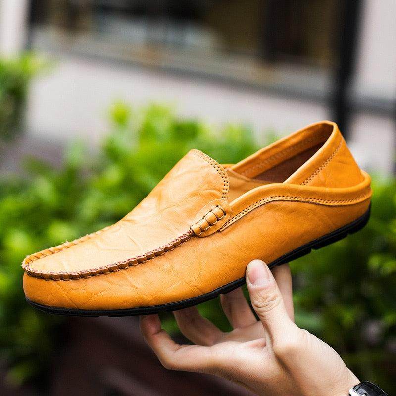 Lightweight casual loafers in orange leather for men, ideal for relaxed outings and summer wear