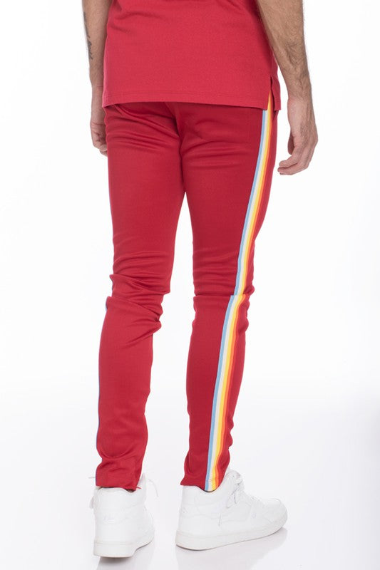 WEIV casual rainbow tape sweatpants in red with rainbow stripe detail on side legs