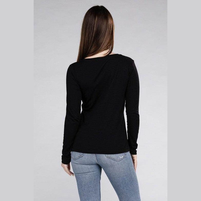 Back view of a ZENANA women's casual travel top for women in black, paired with light blue jeans