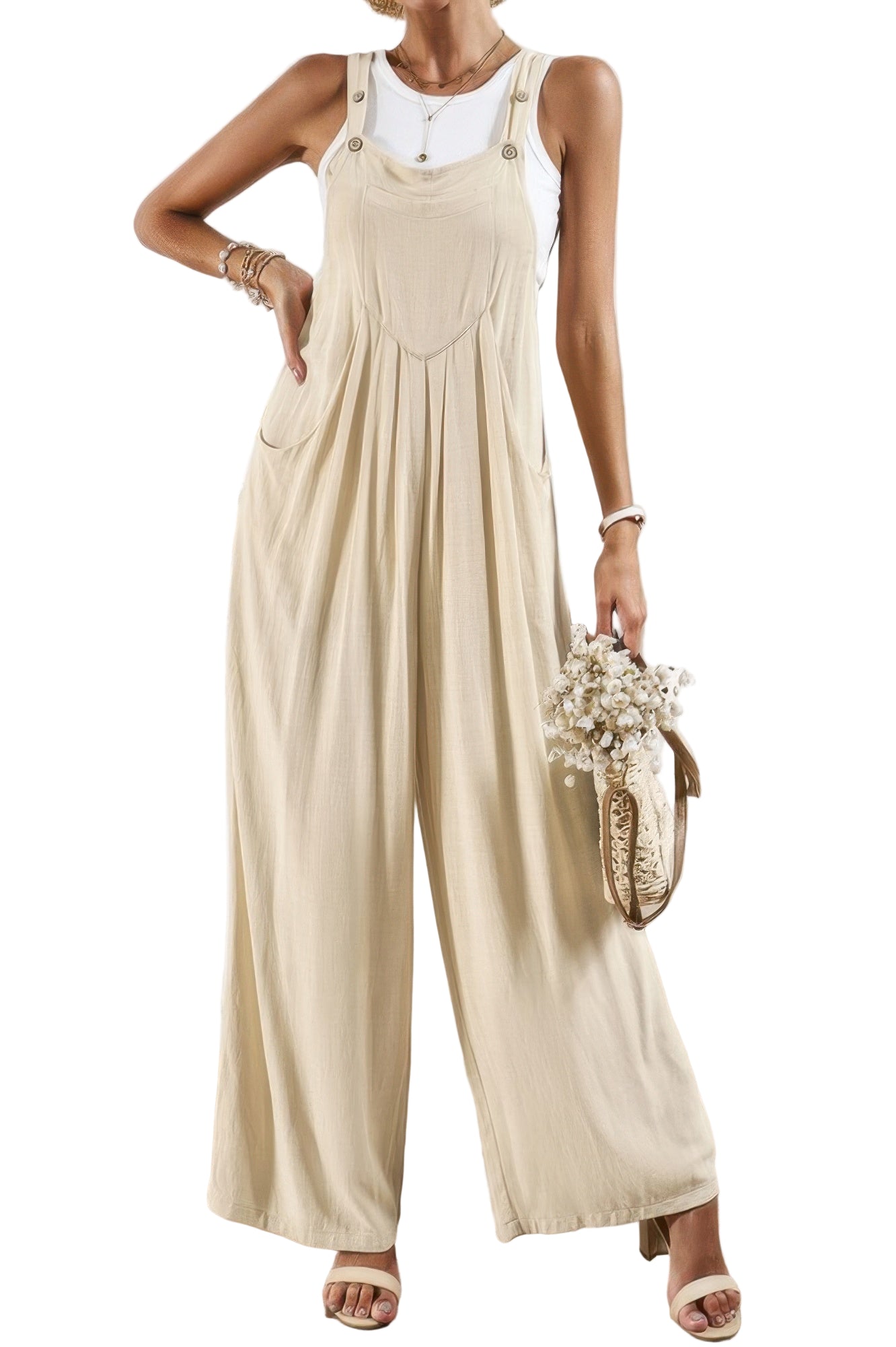 Beige casual vacation jumpsuit for women featuring wide legs and adjustable straps