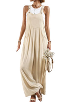 Beige casual vacation jumpsuit for women with adjustable straps and flowy design, perfect for warm weather