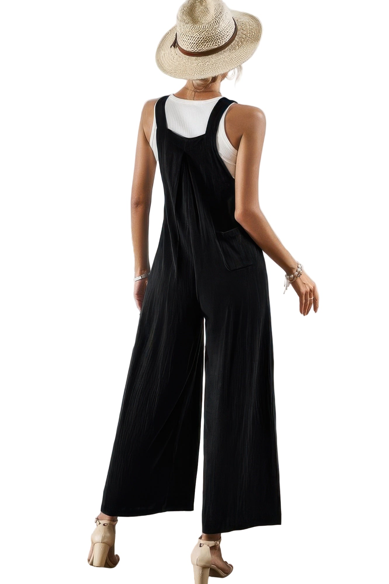 Back view of a black casual vacation jumpsuit for women, featuring a relaxed fit and wide legs