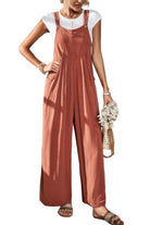 Casual vacation jumpsuit for women in rust color with adjustable straps and side pockets