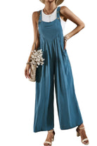 Casual vacation jumpsuit for women in blue with wide legs and button details, perfect for summer outings