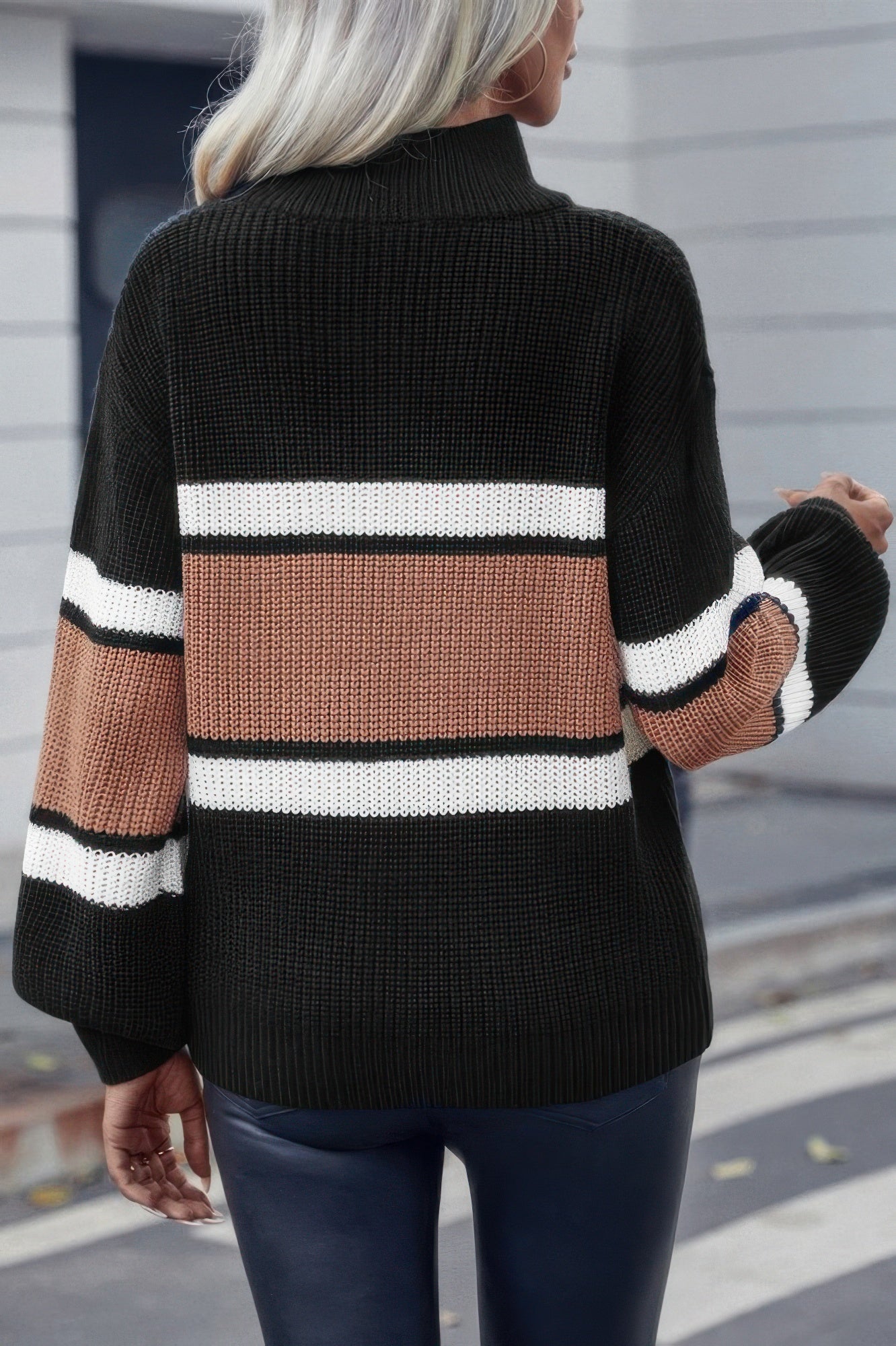 Women's casual vacation pullover sweater in black with striped design in cream and brown