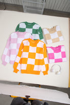 Women's SweatersOrange Checkered Bishop Sleeve Sweater - VacationGrabs