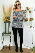Stylish Women's Cheetah Print One Shoulder Top from e Luna, paired with black pants for a chic look