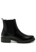 Stylish black Chelsea ankle boots for men with elastic side panels and sturdy soles