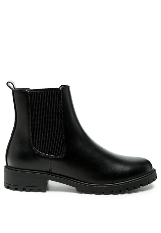 Stylish black Chelsea ankle boots for men with elastic side panels and sturdy soles