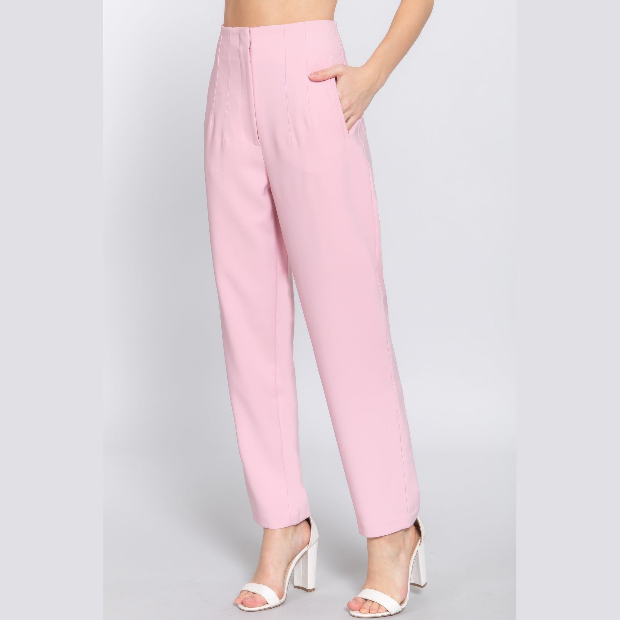 Chic high waisted dress pants for women in soft pink with side pockets and tailored fit
