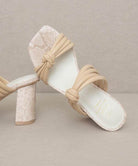 Oasis Society chic vacation heels in beige with a stylish knot design and a comfortable block heel