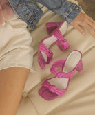 Oasis Society chic vacation heels in pink with a stylish knot design and block heels