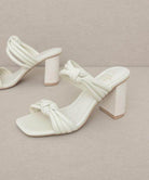 Oasis Society chic vacation heels in white with stylish knot detail and textured block heel