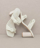 Oasis Society chic vacation heels in white with stylish knotted straps and a textured block heel
