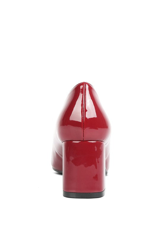 Rag Company red glossy chunky heel pumps for women shown from rear view on white background