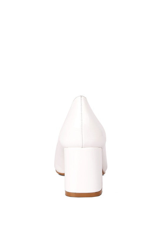 White chunky heel pumps for women by Rag Company with a sturdy block heel and sleek design